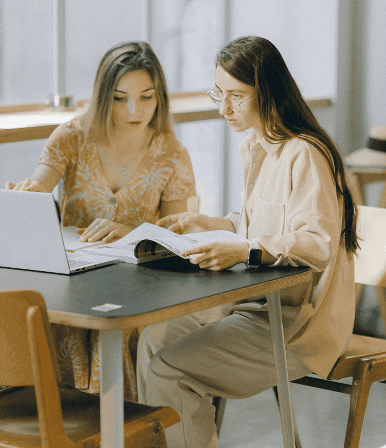 People looking at computer together